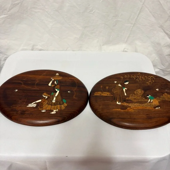 Vintage Indian rosewood wall art plaques with intricate bone inlay designs.
